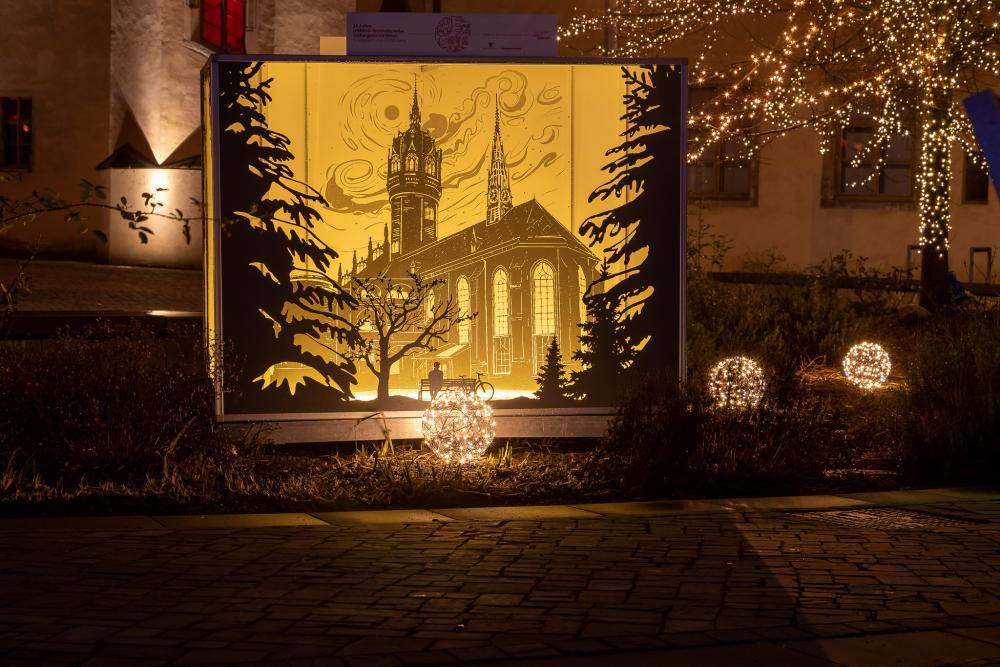 Lichtkubus mit UNESCO-Motiven