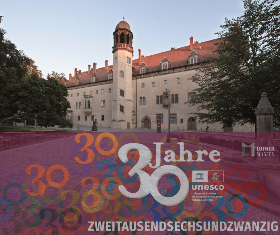 Blick auf das Lutherhaus mit der Design für 30 ahre UNESCO transparent darübergelegt