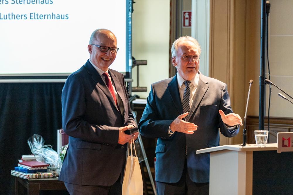 li Stefan Rhein, re Reiner Haseloff